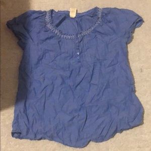 A short sleeved denim and white tunic